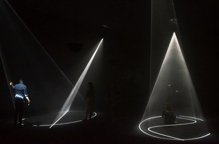 Anthony McCall, United Kingdom/United States b.1946 / Installation view of Crossing (detail) 2016 / Two double video projections (16 minutes), haze machine and sound / Commissioned to mark the tenth anniversary of the opening of the Gallery of Modern Art. Purchased 2016 with funds from Tim Fairfax AC through the Queensland Art Gallery | Gallery of Modern Art Foundation / Collection: Queensland Art Gallery | Gallery of Modern Art / © Anthony McCall