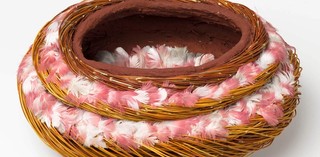 Shirley Macnamara, Australia b.1949 / Erkel (Vessel) 2010 / Twined spinifex (Triodia longiceps) with nylon thread, red ochre, galah feathers and synthetic polymer fixative / 14 x 31 x 25cm / Purchased 2010 with funds from the Bequest of Grace Davies and Nell Davies through the Queensland Art Gallery Foundation / Collection: Queensland Art Gallery | Gallery of Modern Art / © Shirley Macnamara