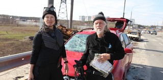 Helen Rose and George Gittoes at Irpin’s ‘Bridge of Death’, Ukraine, 2022